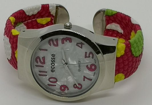 Fashion watch with red bangle strap with white, yellow and green polka dots, large numbers