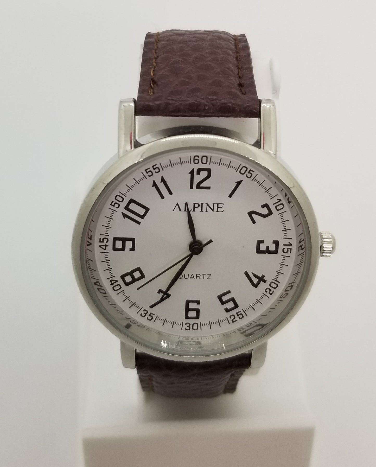 Silver base metal fashion watch with large numbers and brown strap