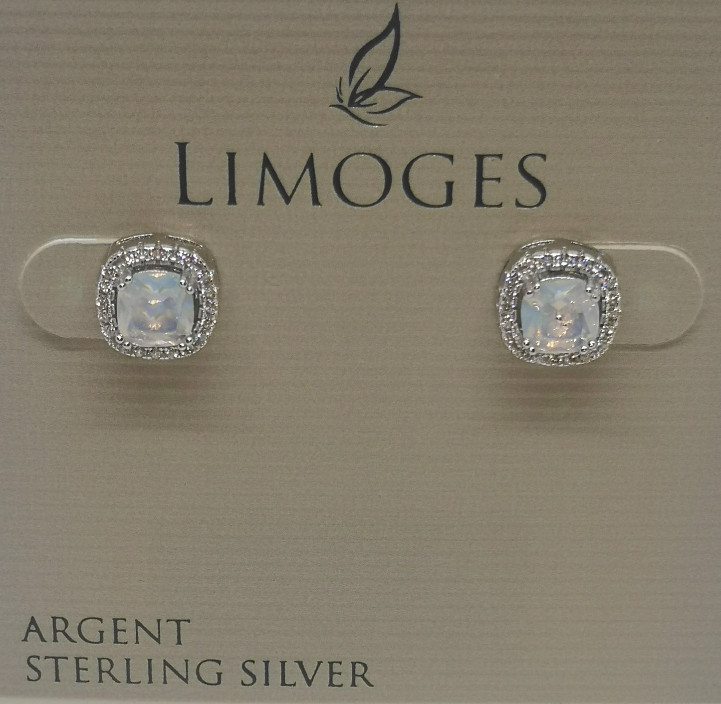 Sterling silver studded earrings with cubic zirconia's surrounding the center stone