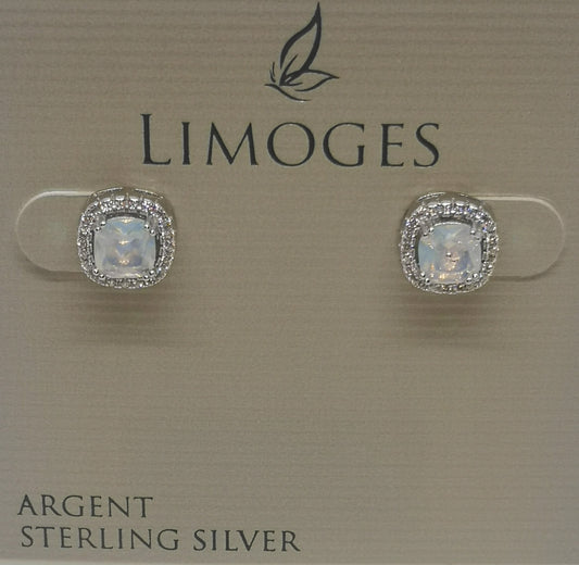 Sterling silver studded earrings with cubic zirconia's surrounding the center stone