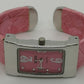 Pink bangle style fashion watch with large numbers