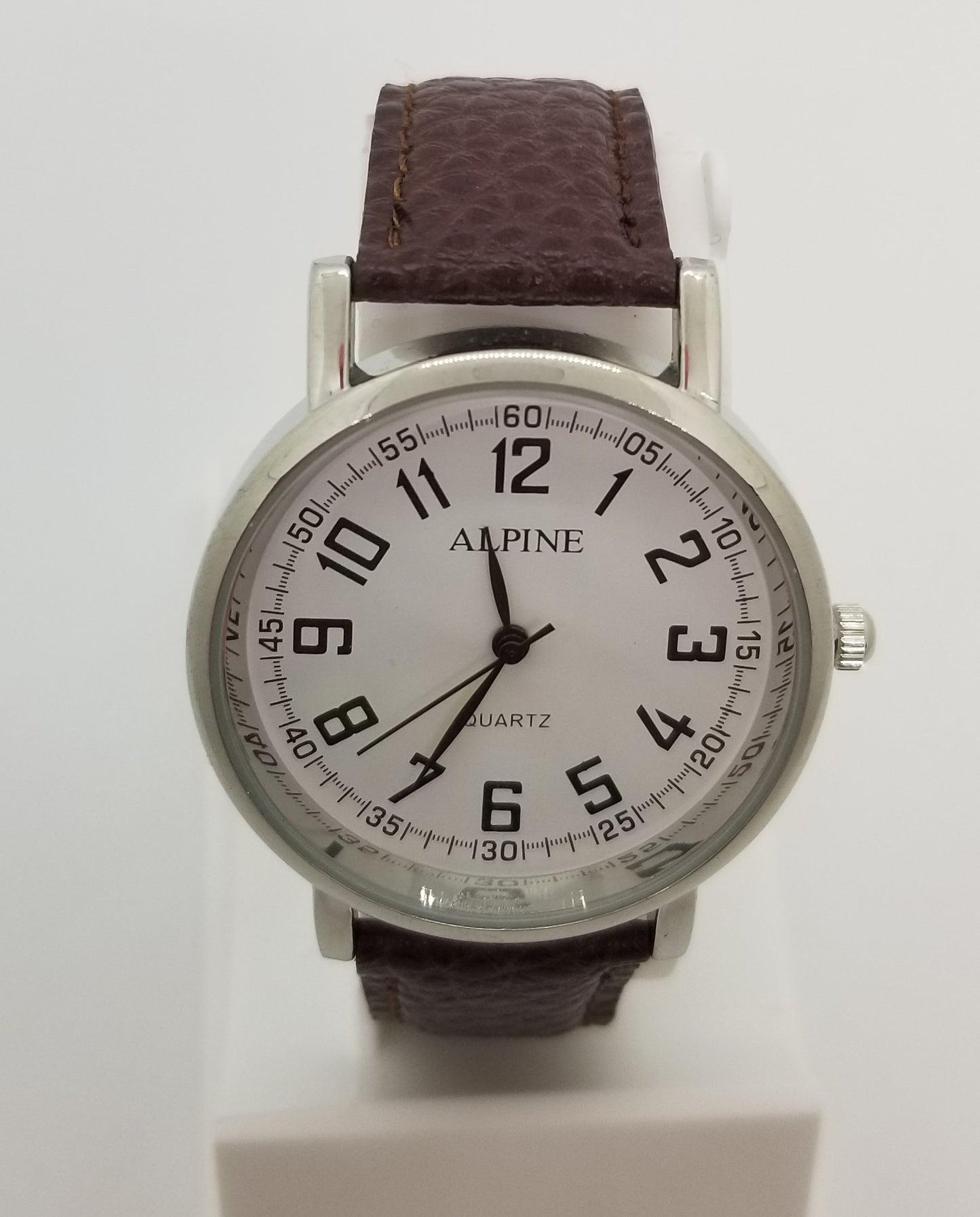 Silver base metal  fashion watch with large numbers and brown strap
